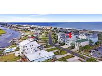 Coastal home with beach access and waterfront views in a charming neighborhood at 1463 Basin Trail, Murrells Inlet, SC 29576