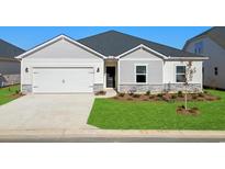 New construction home with gray siding, stone accents, and a two-car garage at 660 Blackthorne Circle Nw, Calabash, NC 28467