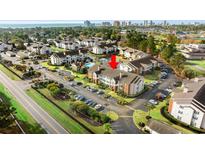 Aerial view of condo community with pool and stunning landscaping close to the beach and the city at 3735 Block House Way # 113, Myrtle Beach, SC 29577