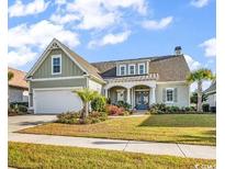 Beautiful two-story home with a large front yard and attractive landscaping at 7060 Belancino Blvd., Myrtle Beach, SC 29572