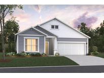 Charming two-story home featuring gray siding, white accents, and a well-manicured lawn with landscape lighting at Tbb3 Farrier Dr., Myrtle Beach, SC 29588