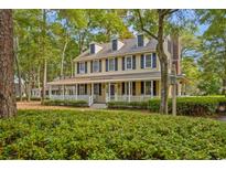 Charming two-story home featuring a wide front porch and traditional design at 3034 Oak Grove Bend # 34 Ar, Murrells Inlet, SC 29576