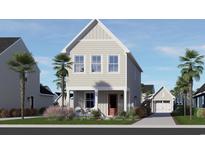 Charming two-story home with a quaint porch and a well-manicured front yard, showcasing curb appeal at 2737 Rowyn St., Longs, SC 29568