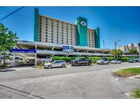 Royal Garden Resort building with parking and ocean views at 1210 N Waccamaw Dr. # 602, Murrells Inlet, SC 29576