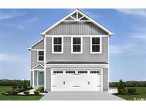 Charming two-story home with gray siding and a white garage door, exuding modern curb appeal and design at 1083 Oak Meadow Dr., Conway, SC 29526
