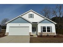 Charming, newly built single-Gathering home featuring stone accents, gray shutters, and an attached two-car garage at 110 Arrow Wood Dr, Conway, SC 29526