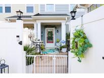 Charming front porch featuring a cozy seating area and a decorated door at 2256 Heritage Loop # 2256, Myrtle Beach, SC 29577