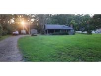 Ranch home with covered porch and large backyard at 354 George Washington Trail, Georgetown, SC 29440