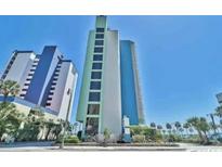 Oceanfront building, blue and teal color scheme, features multiple stories and balconies at 2310 N Ocean Blvd. # 803, Myrtle Beach, SC 29577