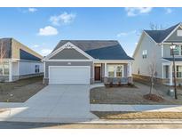 Charming single-story home featuring a covered entryway, garage, and a well-manicured lawn at 2472 Campton Loop, Conway, SC 29527