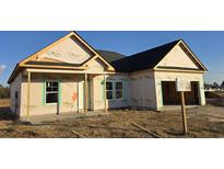 New construction home with wrap-around porch and two-car garage at 1009 Jase Dr., Longs, SC 29568