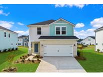 Two-story house with light brick and siding, two-car garage, and landscaped yard at 2113 Copper Creek Ct., Longs, SC 29568