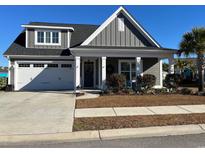 Charming single-Gathering home featuring a manicured lawn and a welcoming entrance at 914 Mary Read Dr., North Myrtle Beach, SC 29582