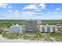 Aerial view of oceanfront resort complex with multiple buildings, pools, and beach access at 6804 N Ocean Blvd. # 1537, Myrtle Beach, SC 29572