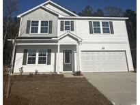 Charming two-story home with gray and white siding, complemented by dark shutters and an attached two-car garage at 896 Agostino Dr., Myrtle Beach, SC 29579