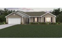 Craftsman style home with two-car garage and landscaped lawn at 1067 Frances Parker Rd., Georgetown, SC 29440