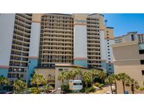 Spacious multi-story resort building with balconies, palm trees, and well-maintained landscaping at 4800 S Ocean Blvd. # 920, North Myrtle Beach, SC 29582