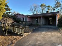 Ranch style home with carport and ramp access at 807 Anne St., North Myrtle Beach, SC 29582