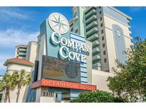 Exterior view of Compass Cove Oceanfront Resort displaying resort amenities at 2311 S Ocean Blvd. # 1125, Myrtle Beach, SC 29577