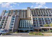 Oceanfront high-rise building with ample parking and inviting entrance at 201 77Th Ave. N # 1133, Myrtle Beach, SC 29577