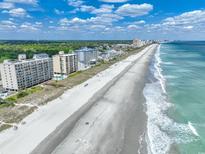 Aerial view of oceanfront property with beach access and resort-style amenities at 3601 S Ocean Blvd. # 5F, North Myrtle Beach, SC 29582