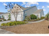 Charming home with a two-car garage and well-maintained landscaping at 4463 Livorn Loop # 4463, Myrtle Beach, SC 29579