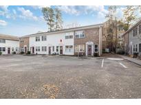 Charming multi-Gathering home featuring a spacious parking lot and well-maintained landscaping at 6706 Bryant St. # B, Myrtle Beach, SC 29572