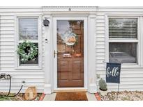 Charming home featuring an inviting entrance with glass door and decor at 6706 Bryant St. # B, Myrtle Beach, SC 29572