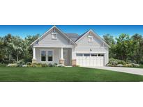 Craftsman style home with gray siding, two-car garage, and landscaped lawn at 3024 Reamer Dr., Murrells Inlet, SC 29576