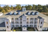 Attractive three-story building with dormers and balconies at 1001 World Tour Blvd. # 101A, Myrtle Beach, SC 29579