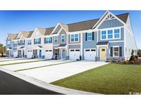 Charming new construction townhomes with colorful doors and attached garages at 2099 Nw Parow Ln Nw # C, Calabash, NC 28467