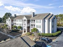 Attractive two-story condo building with ample parking at 3741 Block House Way # 724, Myrtle Beach, SC 29572