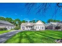 Charming single-story home with a well-manicured lawn and inviting curb appeal, perfect for a relaxed lifestyle at 4382 Saint Annes Ct., Myrtle Beach, SC 29579