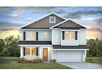 Two-story house with gray and white siding, a two-car garage, and landscaping at 814 Ireland Dr., Longs, SC 29568