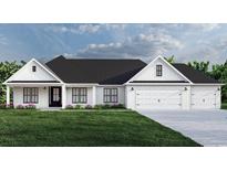 White farmhouse exterior with a black roof, two-car garage, and landscaping at 2180 Pettus Way, Surfside Beach, SC 29575