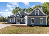 Charming single-Gathering home featuring a well-manicured lawn and inviting curb appeal in a beautiful neighborhood at 1033 Pisgah Church Rd., Aynor, SC 29511