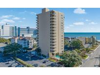 Oceanfront building with parking and pool; close to other buildings at 210 75Th Ave N # 4011, Myrtle Beach, SC 29572