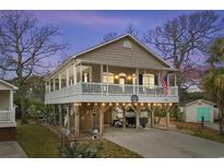 Elevated beach home with large deck and parking underneath at 6001 - 7032 S Kings Hwy., Myrtle Beach, SC 29575