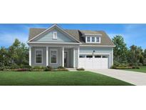 Light blue craftsman style home with white trim and a two-car garage at 9052 Binnicker Dr., Murrells Inlet, SC 29576