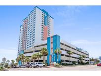 Oceanfront high-rise building with parking and signage at 1605 S Ocean Blvd. # 414, Myrtle Beach, SC 29577