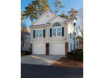 Two-story townhome with two-car garage and landscaping at 1370 Cottage Dr., Myrtle Beach, SC 29577