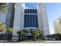 The Breakers oceanfront resort boasts a stunning exterior with palm trees and ample parking at 2006 N Ocean Blvd. # 776, Myrtle Beach, SC 29577