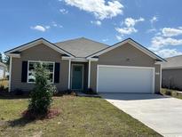 Charming single Gathering home with a 1 car garage and neutral color palette at 201 Ashworth Dr., Tabor City, NC 28463