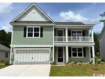 Charming two-story home with a covered front porch and a two car garage at 507 Slaty Dr., Myrtle Beach, SC 29588