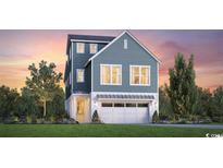 Two-story home with gray siding, white trim, and a two-car garage at 512 9Th Ave. S, North Myrtle Beach, SC 29582