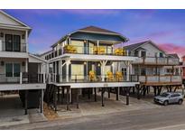 Two-story beach home with ocean views and multiple balconies at 6001 - B-4 S Kings Hwy., Myrtle Beach, SC 29575