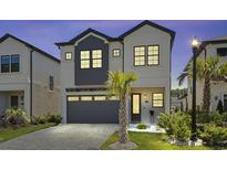 Two-story home with gray accents and landscaping at 6760 Ocean Breeze Loop, Myrtle Beach, SC 29572