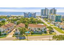 Aerial view of beachside property with ocean views and nearby high rises at 212 4Th Ave. N # 102, North Myrtle Beach, SC 29582