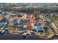Waterfront property with an outlined lot ready to build your dream home with spectacular views at 9107 Marina Pkwy., Myrtle Beach, SC 29572