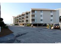Coastal condo building with parking and ocean views at 9570 Shore Dr. # 211, Myrtle Beach, SC 29572